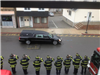 Stoneham Firefighters Pay Tribute to MIT Police Officer Sean Collier as the Procession Passes the Fi