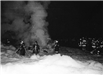 Firefighters Trudging Through Snow to Attend to a Fire 2