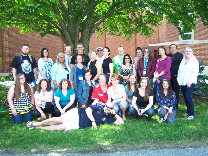 Group Posing on a Lawn