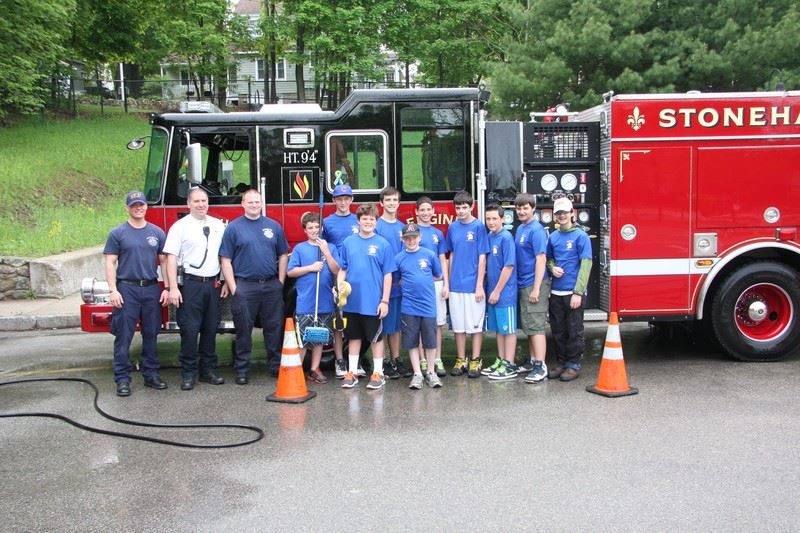 Stoneham Firefighters Association Making a Donation to Boy Scout Troop 513 at a Recent Fundraising E